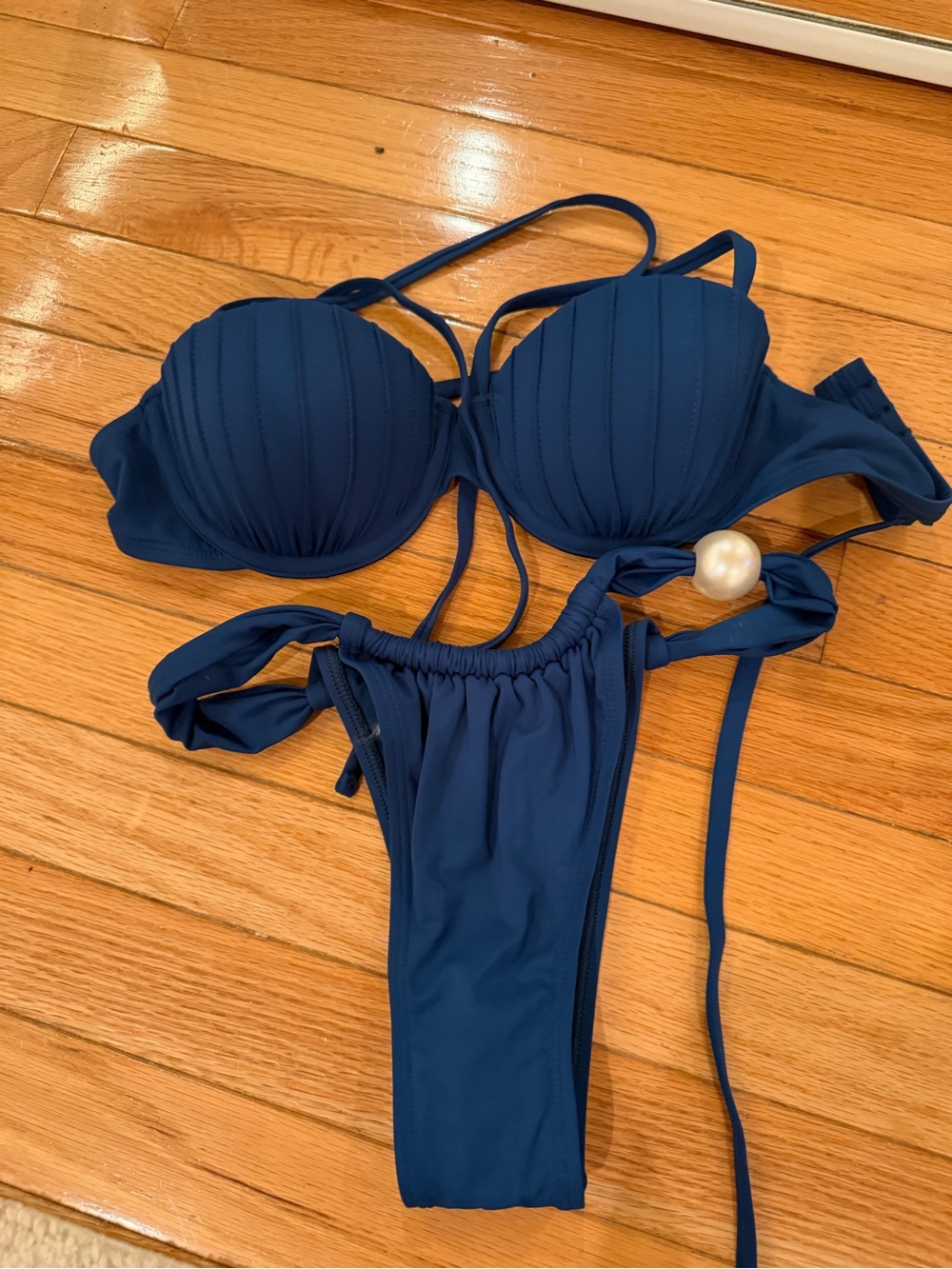 Blue One-Piece Swimwear with Pearl Accent